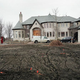 A McMansion, crawling out of hell. Photo: Credit: Scott Olson / Staff / Getty